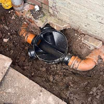 Manhole installation, underground pipe connection